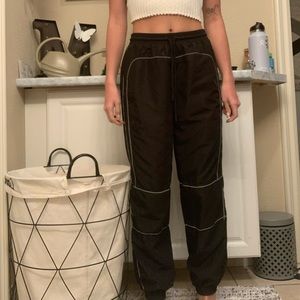 Reflective track pants.